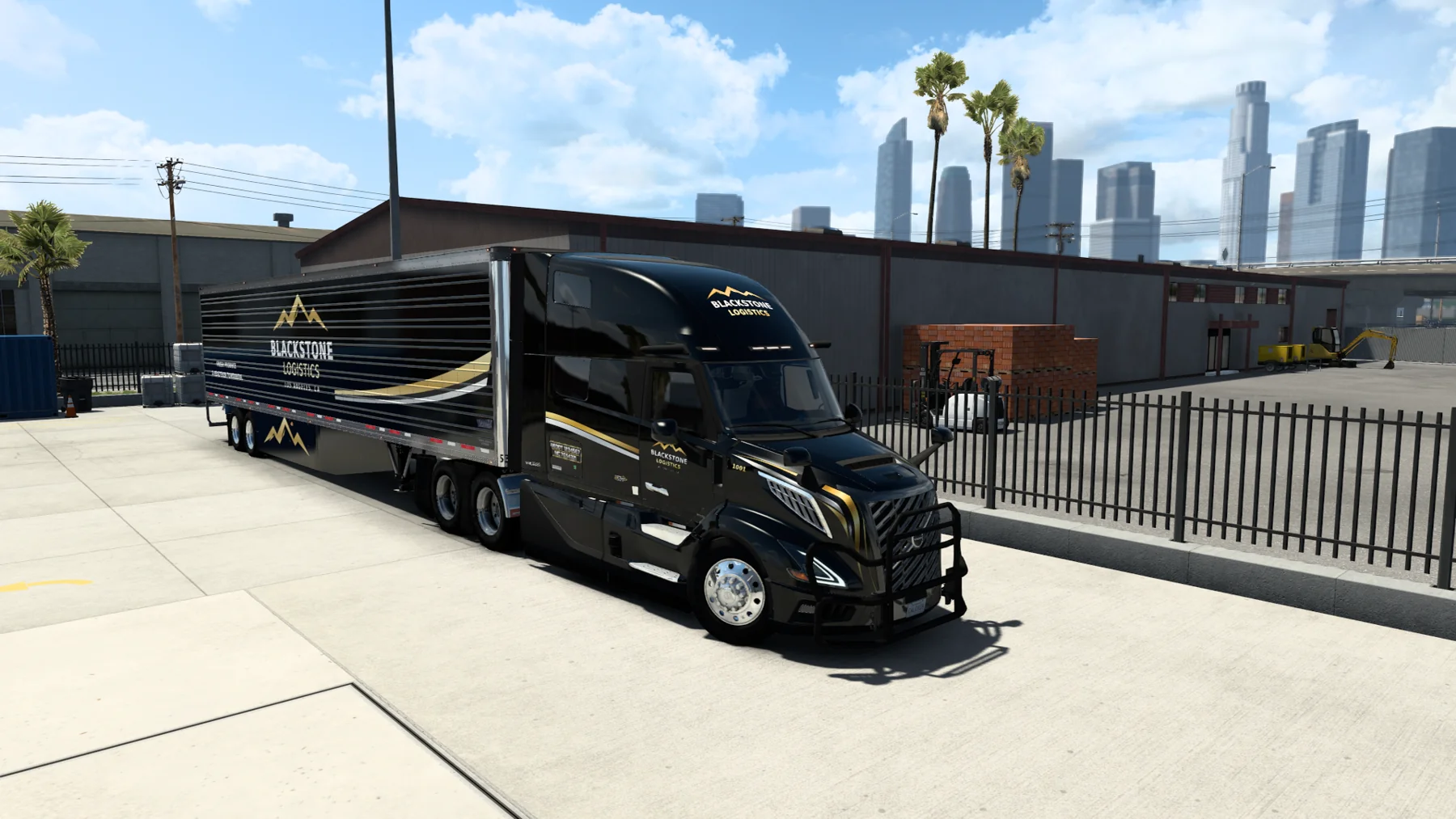 Blackstone Logistics black and gold Volvo truck with matching trailer